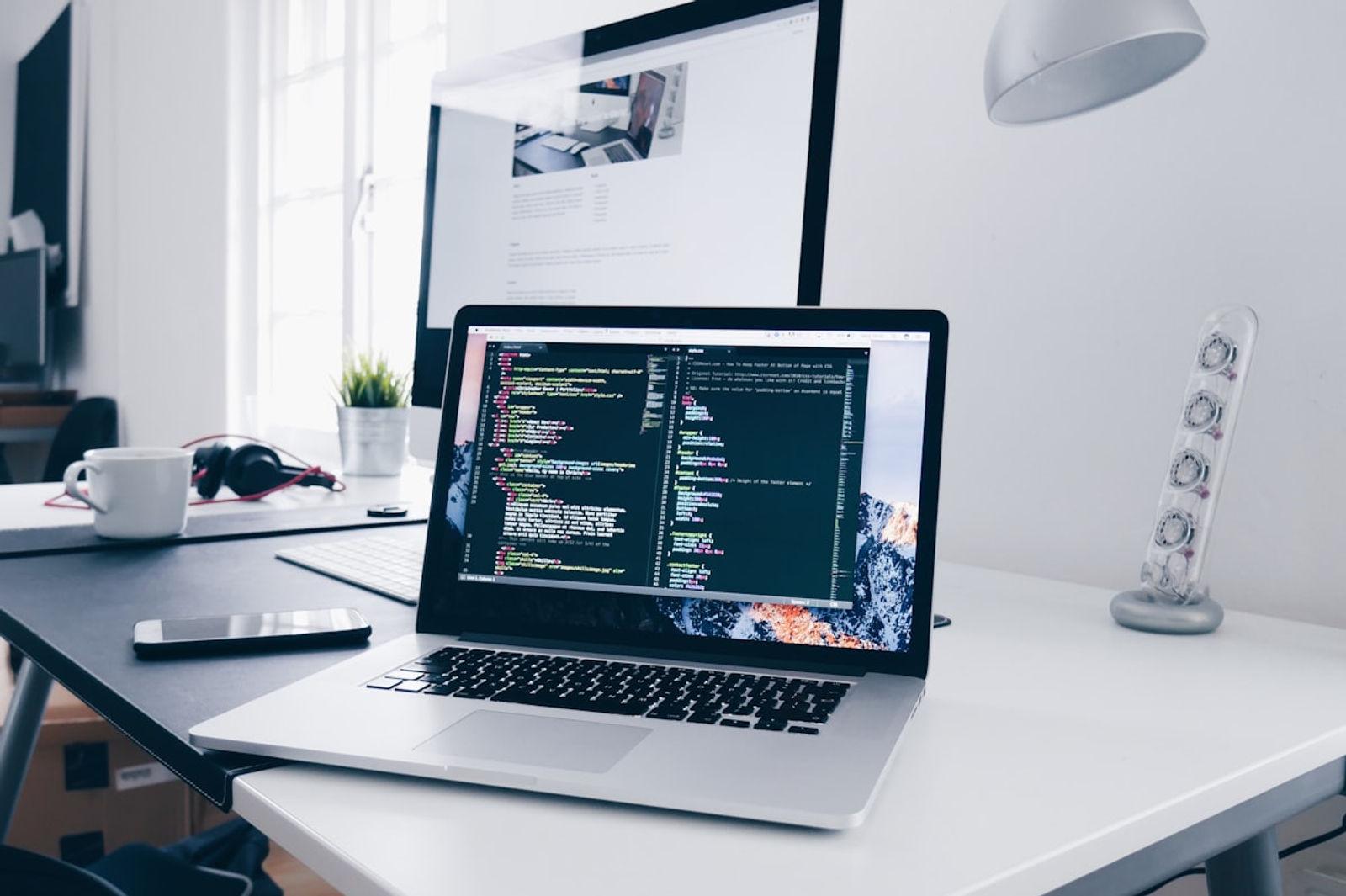Startup tech stack selection on laptop